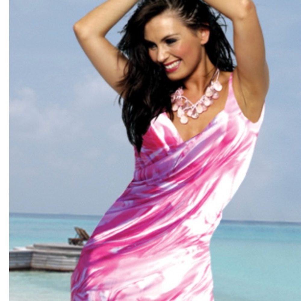 Stylish sleeveless coverup perfect for poolside & the beach.
